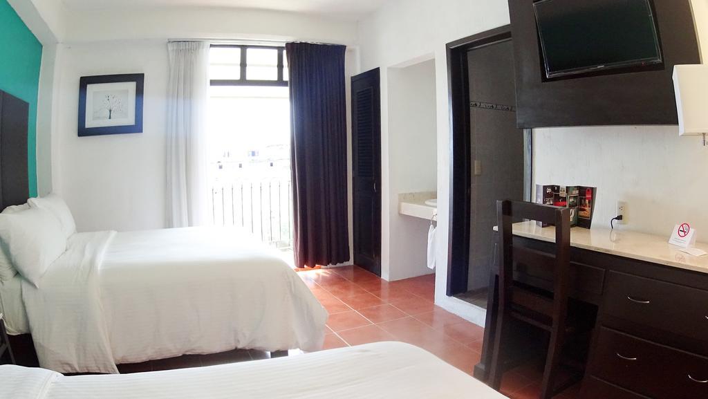 Hotel Santa Fe Tlatlauquitepec Bagian luar foto