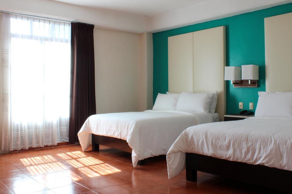 Hotel Santa Fe Tlatlauquitepec Bagian luar foto