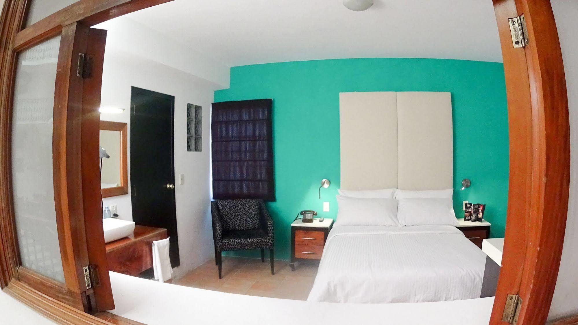 Hotel Santa Fe Tlatlauquitepec Bagian luar foto